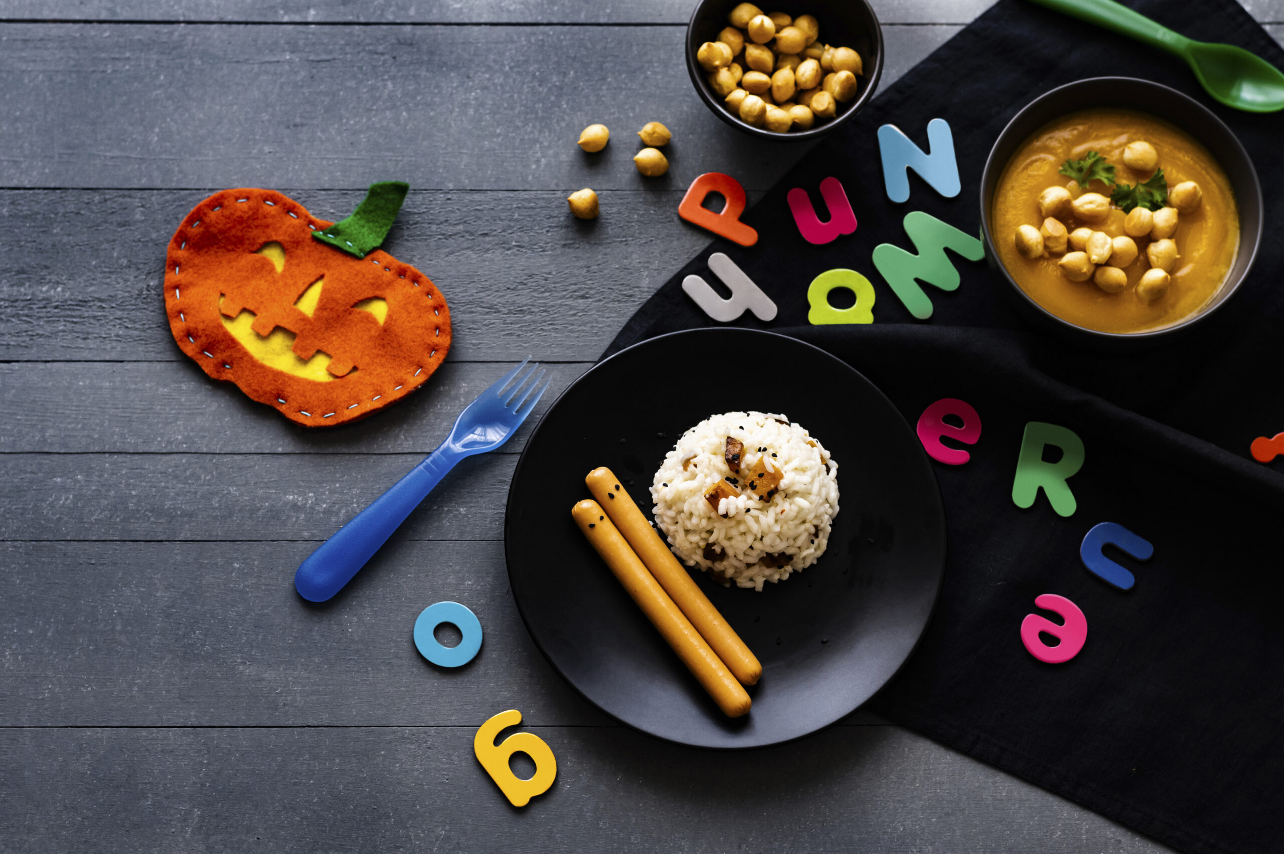 kids halloween party food with pumpkin risotto frankfurters background wallpaper scaled