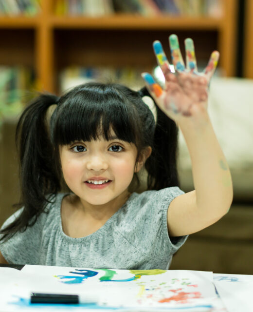 cheerful girl kid enjoy color painting with creativity ideas present messy hand home